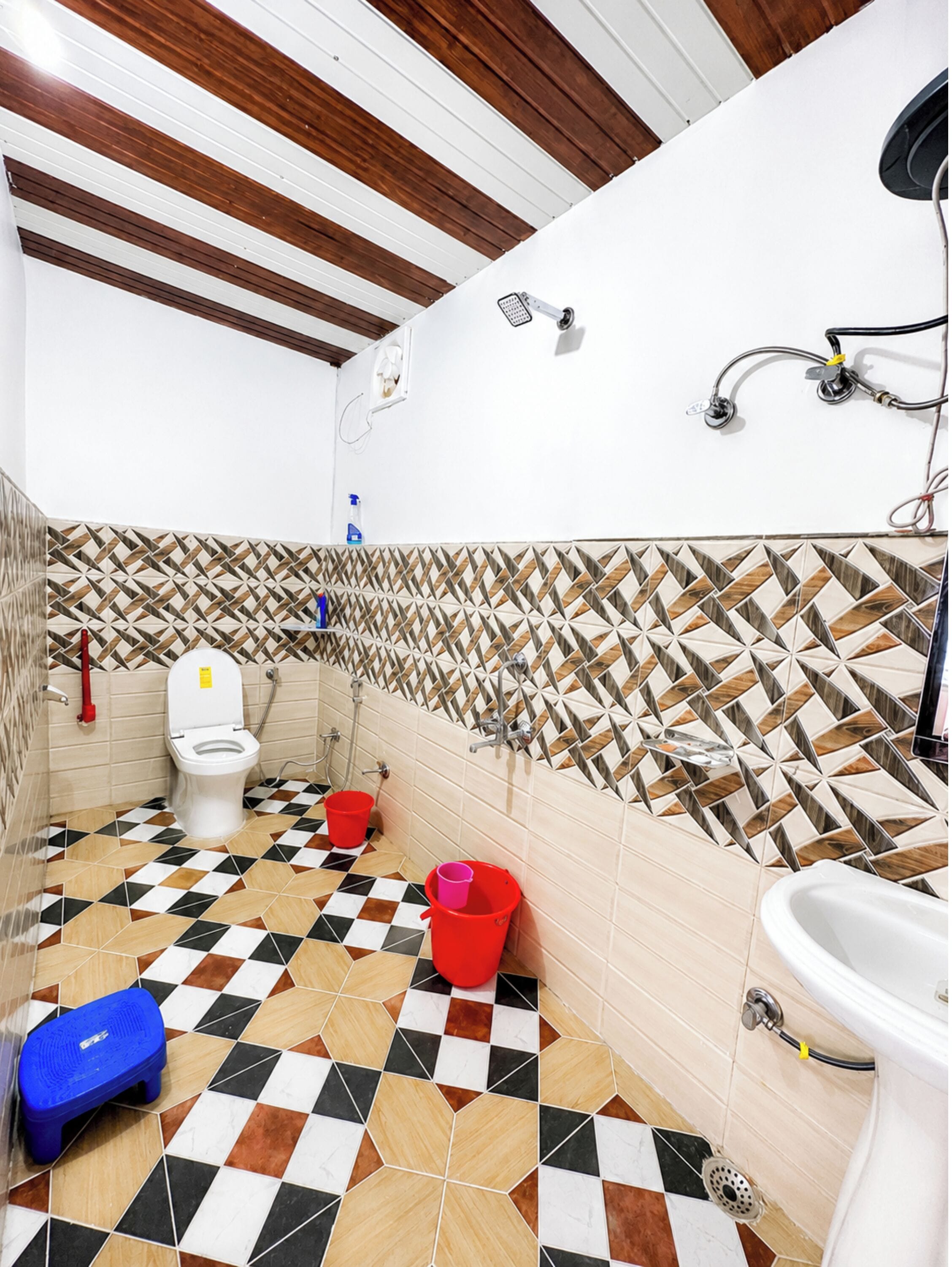 Shower, rainfall showerhead, slippers, towels