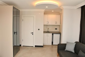 Deluxe-Suite, Balkon | Wohnbereich