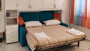 1 habitación, tabla de planchar con plancha, wifi y ropa de cama 
