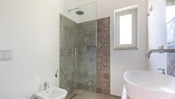 Studio, Patio, Garden View | Bathroom | Shower, free toiletries, hair dryer, towels