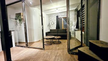 Superior-Vierbettzimmer, Stadtblick | Wohnbereich