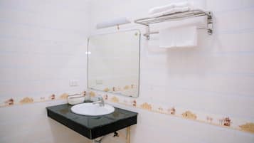 Hair dryer, slippers, towels, soap