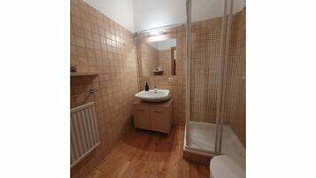 Shower, bidet, toilet paper