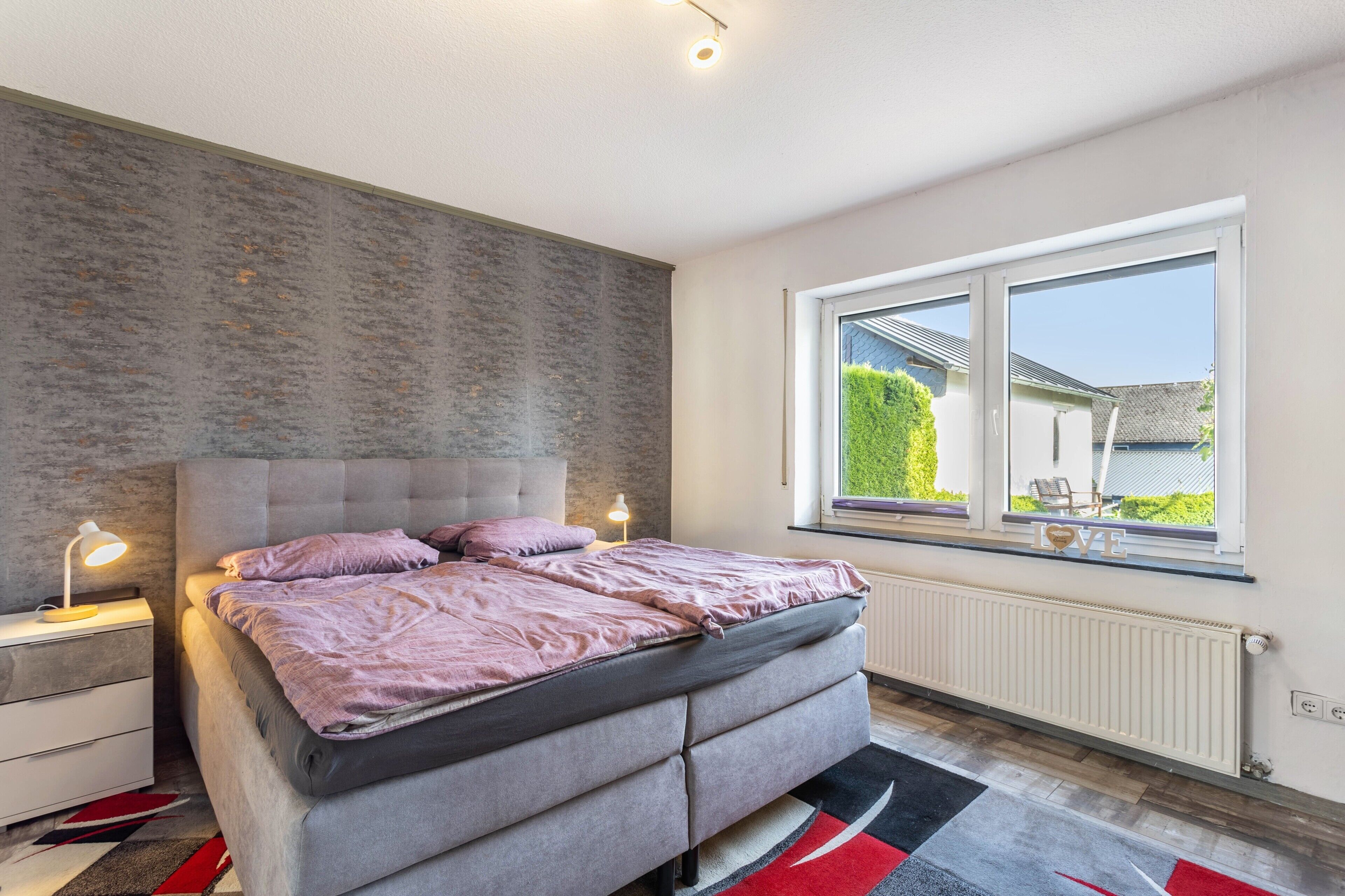 1 slaapkamer, een strijkplank/strijkijzer, wifi, beddengoed