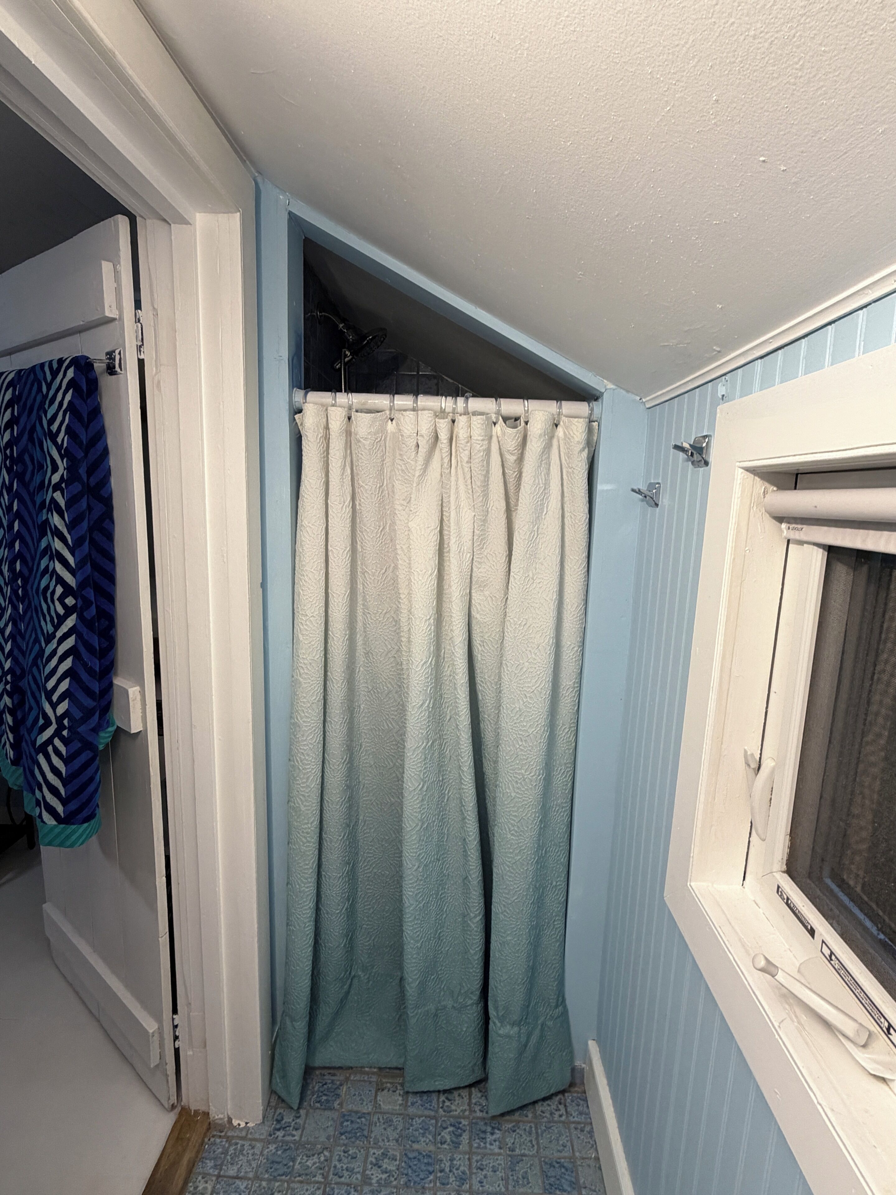 Shower, towels, soap, toilet paper