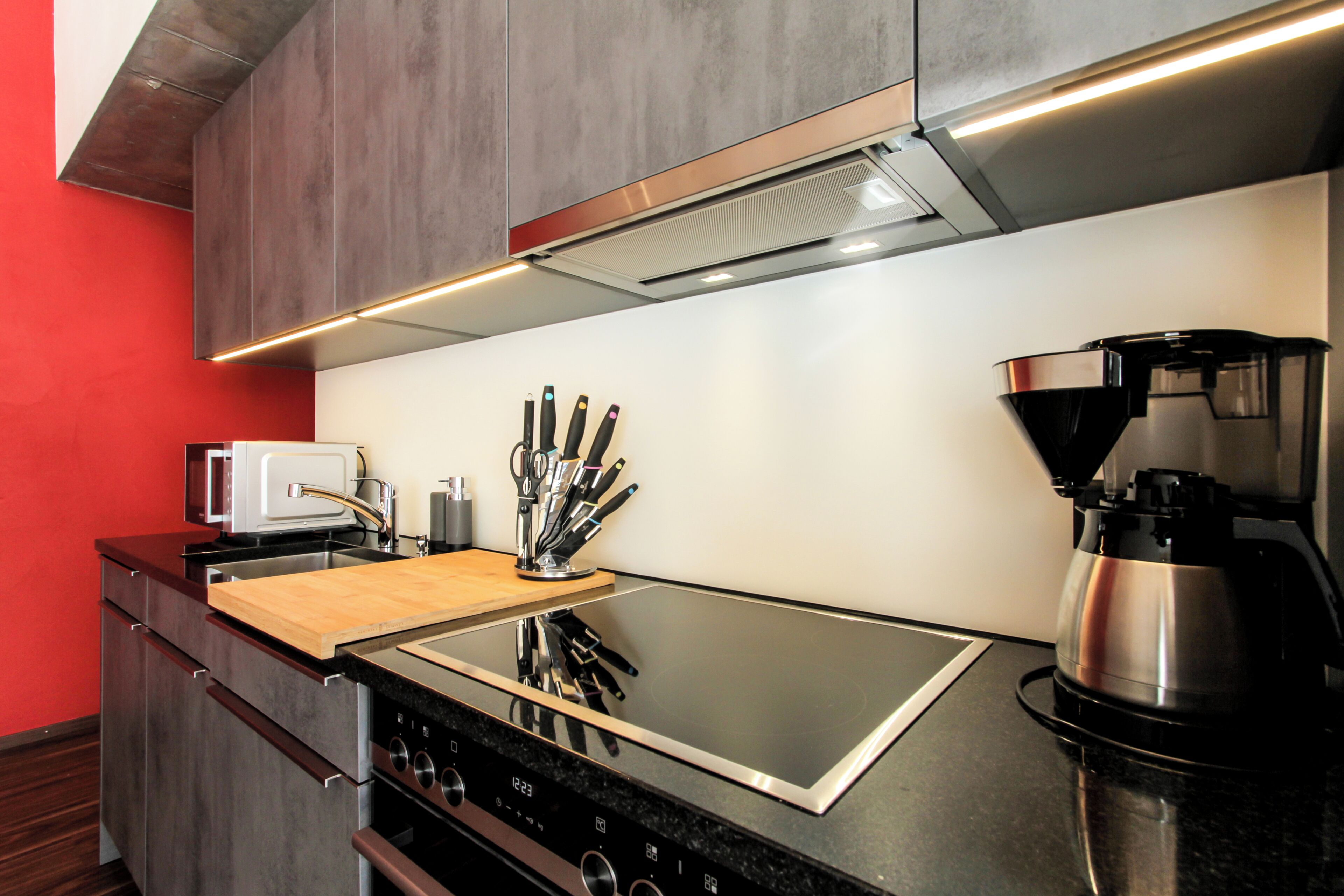 Coffee/tea maker, fridge, microwave, oven
