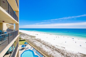A beachfront hotel with a pool, beach, and ocean view. - Phoenix V 907 1 Bedroom Condo (Orange Beach)