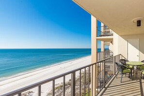 A balcony with a view of a beach and ocean. - Phoenix I 1106 1 Bedroom Condo (Orange Beach)