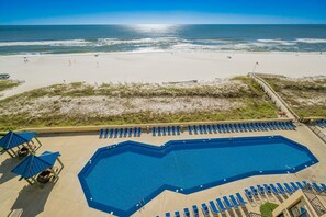 A swimming pool with a view of the beach and ocean. - Phoenix V 711 1 Bedroom Condo (Orange Beach)