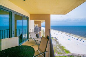 A balcony with a view of a beach and ocean. - Phoenix I 1146 1 Bedroom Condo (Orange Beach)