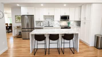 Coffee/tea maker, fridge, microwave, oven