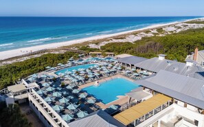 A resort with a large pool, beach access, and a view of the ocean. - 287 W Lake Forest Dr - WaterColor Home (Santa Rosa Beach)