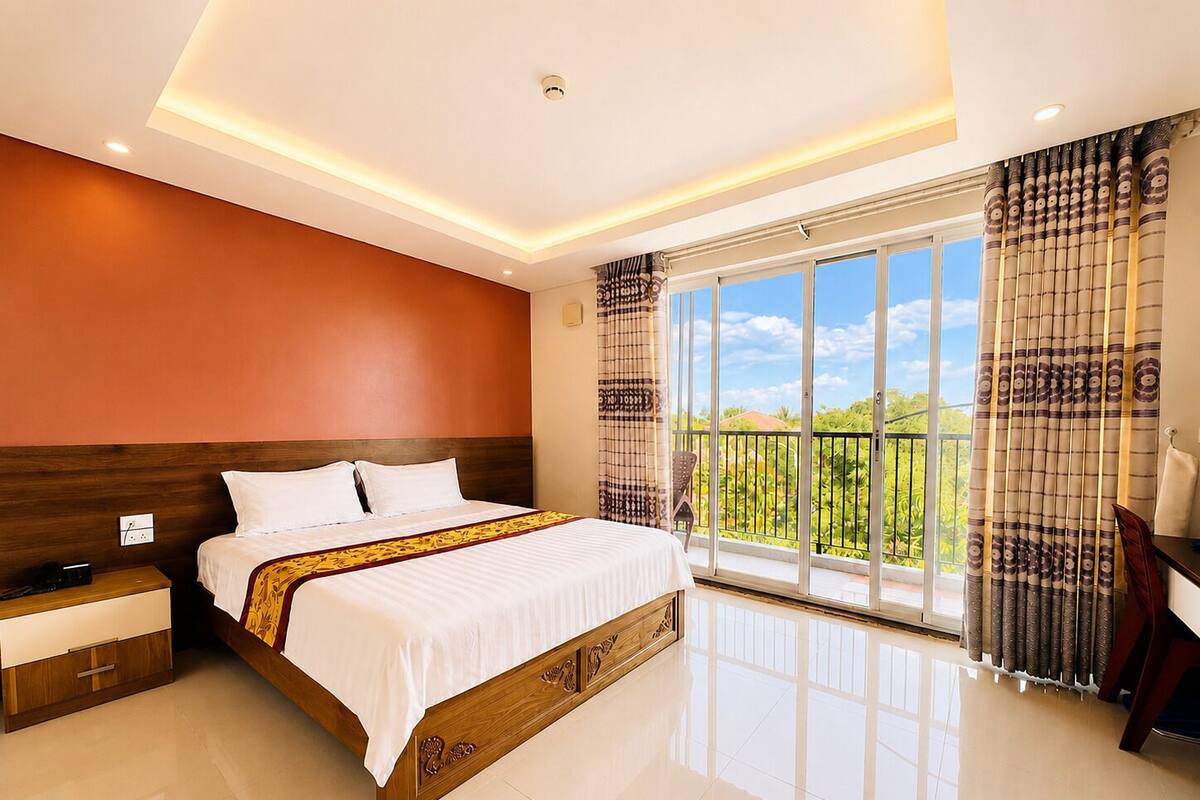Suíte standard, vista para o jardim | Cofres nos quartos, escrivaninha, cortinas blackout