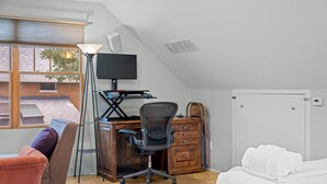A room with a desk, chair, and a bed. - New! Private Carriage House | Walk to Broadway Shops & Restaurants (Denver)