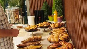 A buffet table with various baked goods. - SElaf Almaqam Nour (Makkah)
