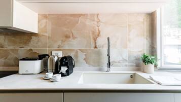 Apartment | Private kitchen | Espresso maker, full-size fridge, microwave, oven