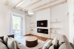 Apartament | Sala d'estar | Televisor de 30 polzades amb canals digitals 