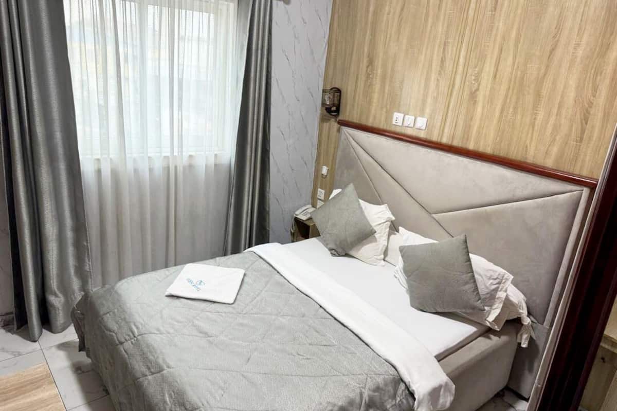 Classic Double Room, Balcony, City View | Iron/ironing board, WiFi (free)