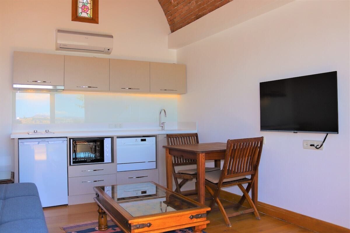 Suite familiar, patio, vistas al mar | Cocina básica privada