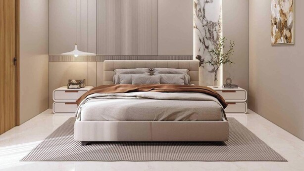 Un dormitorio moderno con una cama grande, mesitas de noche, aire acondicionado montado en la pared y un jarrón decorativo.
