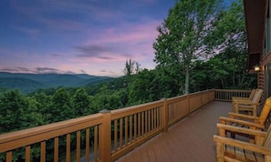 A wooden deck with a view of a forested mountain range. - 2 Deck Views Pool Table Hot Tub Spacious (Mars Hill)