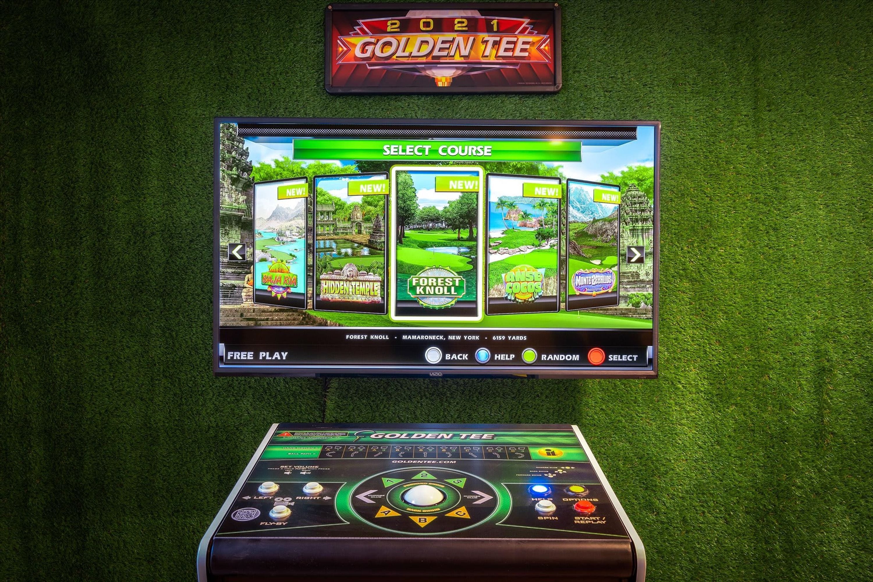 A slot machine interface with a screen displaying various game options and a control panel below.