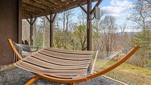A hammock under a wooden pergola with a view of trees and mountains. - 6 Br Sleeps 16 - Game Room - Hot Tub - Firepit (Fairview)