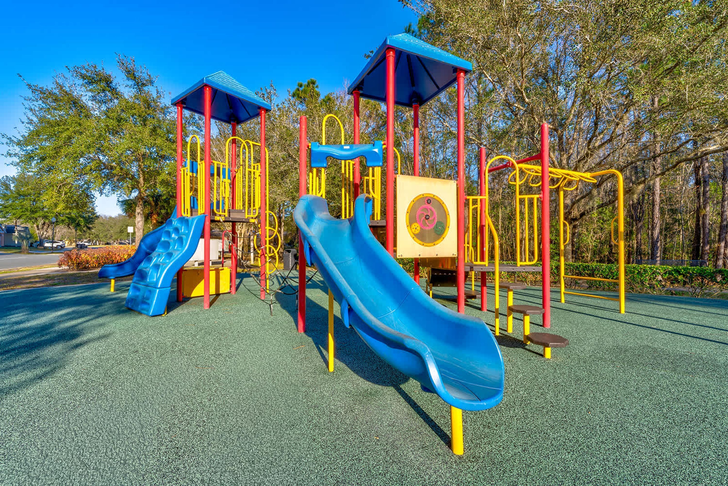 A playground with slides and climbing structures.