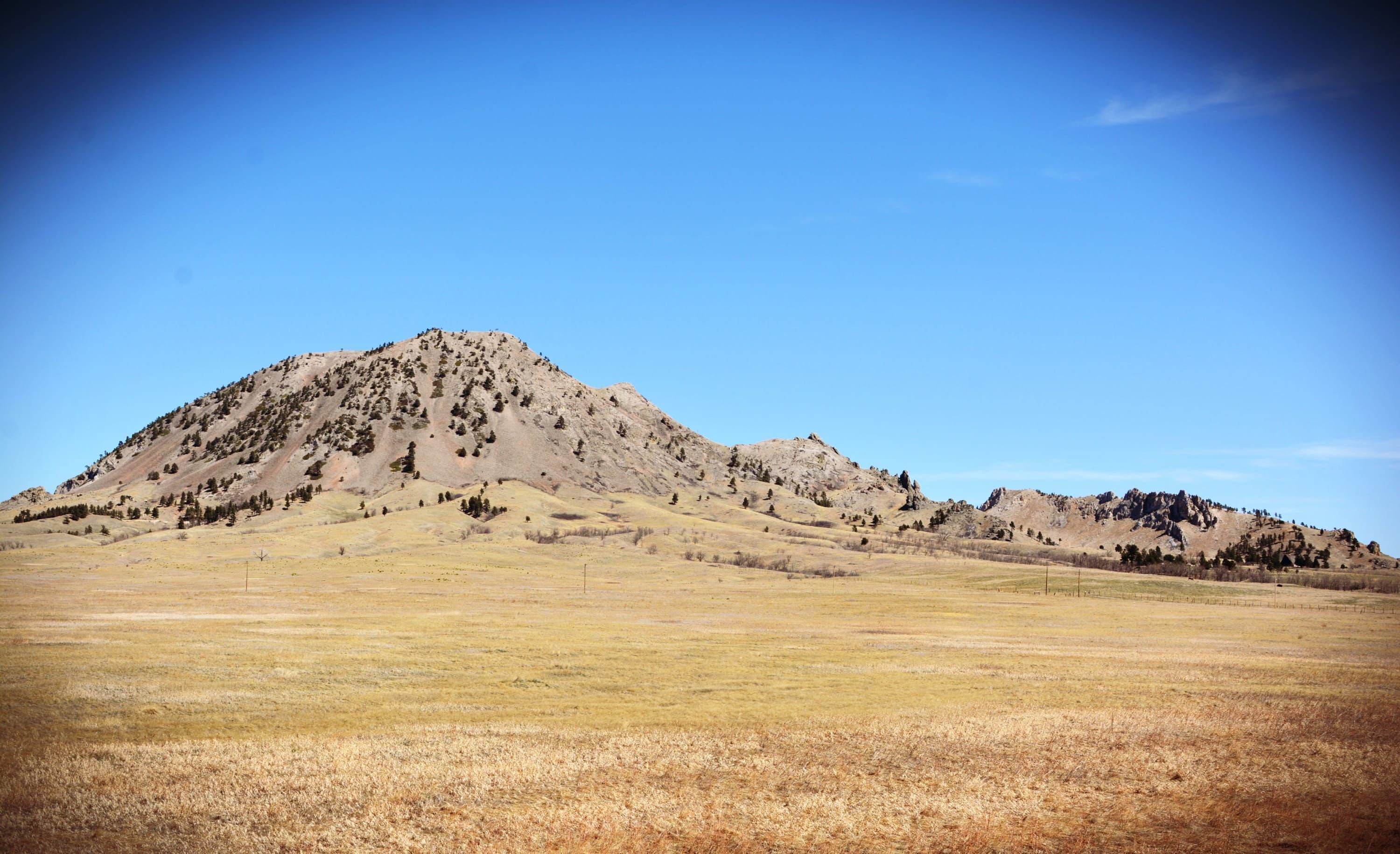 A mountain landscape with a clear sky.