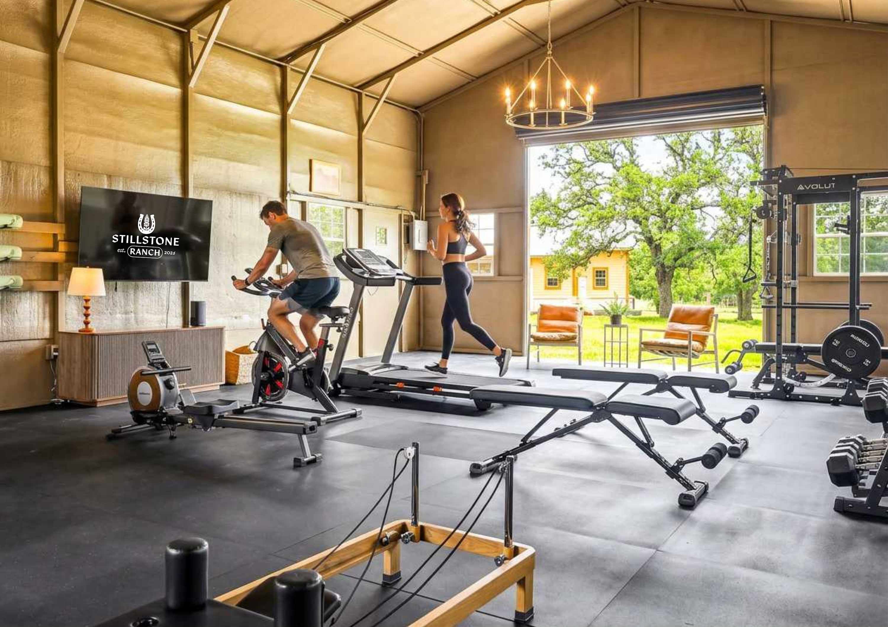 A gym with treadmills, weights, and a TV screen displaying 'STILLSTONE RANCH 2023'.