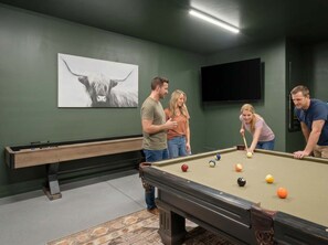 A pool table in a room with a green wall and a bull painting. - The Good Life Oasis Luxury 5BR Home Sleeps 16 (Glendale)
