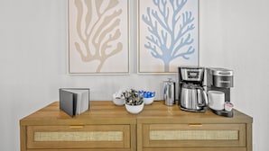 A wooden cabinet with a coffee maker and a book. - 7-bedrooms Sports Court Pool Putt Putt (Seminole)