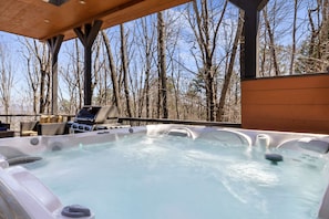 A hot tub with a wooden deck and a grill area. - Mtn Views Sleeps 8 Hot Tub Game Room Fireplace (Blue Ridge)