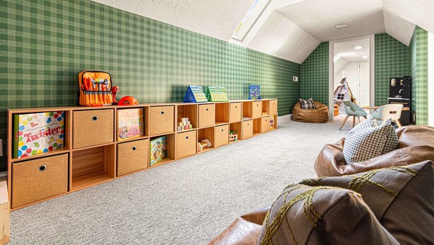 A child's playroom with a loft bed, storage units, and a cozy seating area. - 14k sq ft Mountaintop Estate - Private Golf Course (Fletcher)