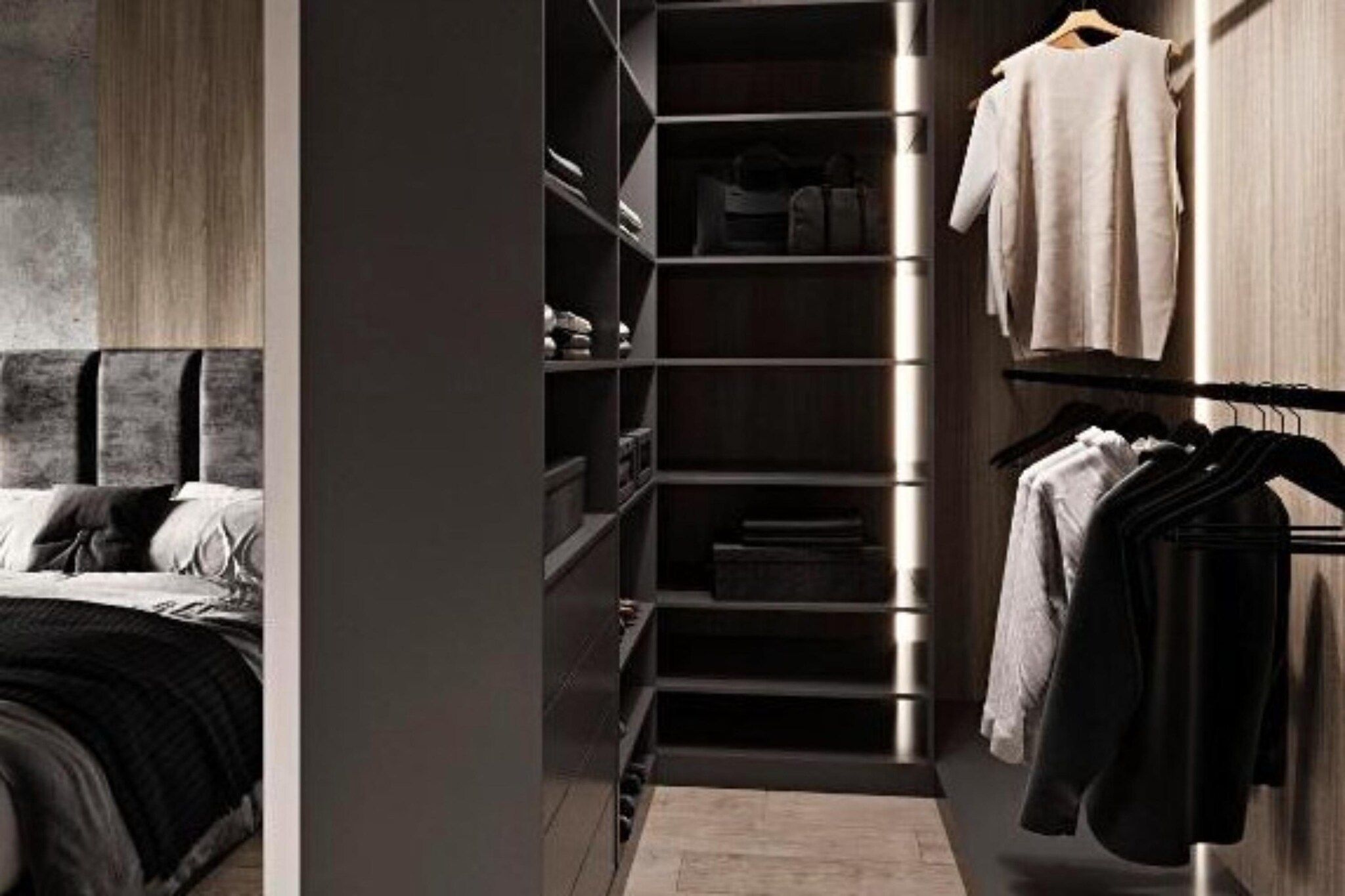 A modern bedroom with a bed, a walk-in closet with shelves, and a hanging rack.