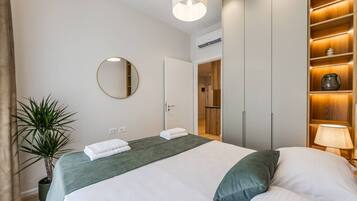 1 habitación, tabla de planchar con plancha, wifi y ropa de cama