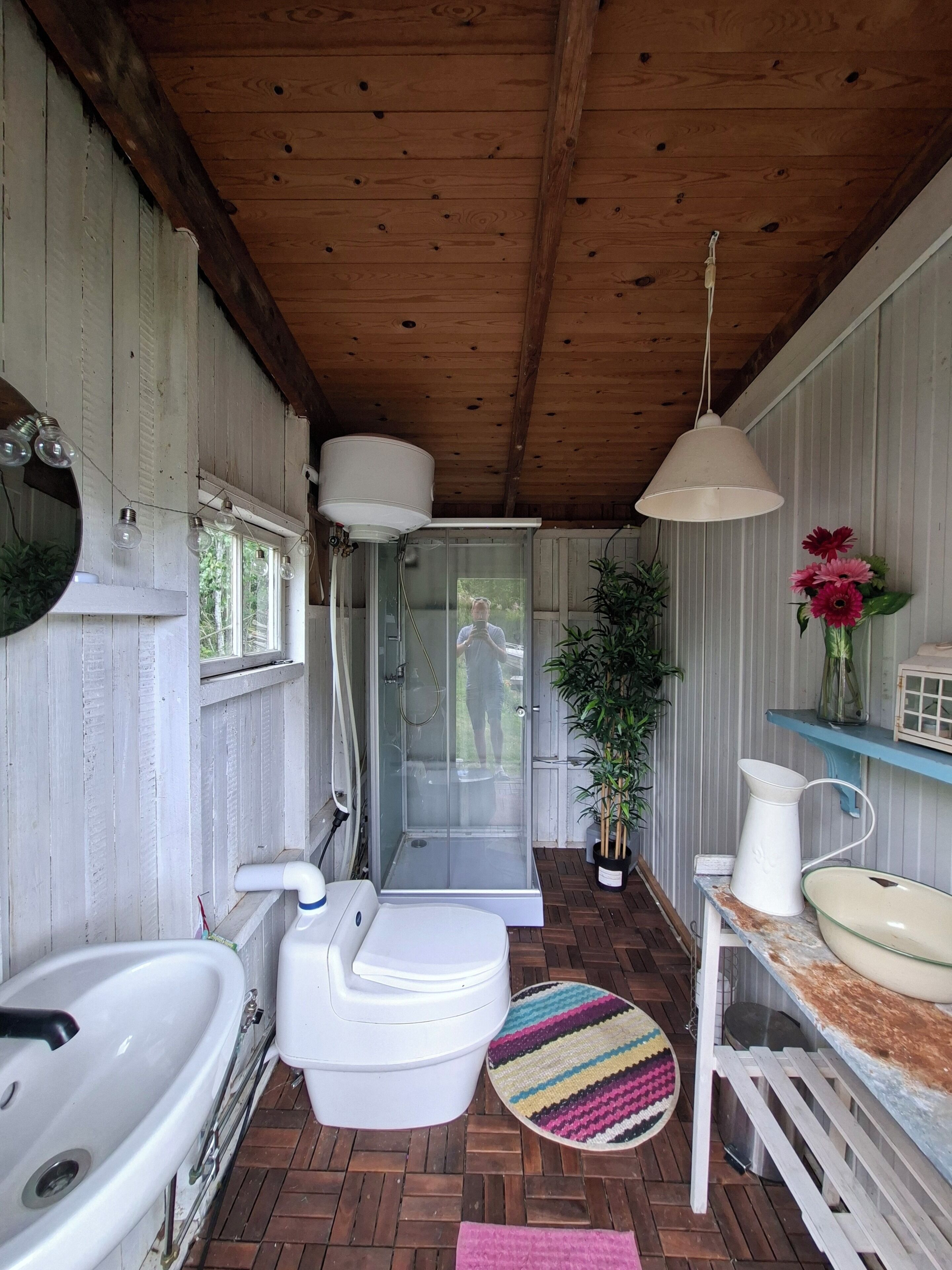 Shower, towels, soap, toilet paper