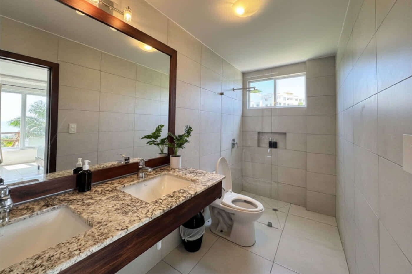 Shower, hair dryer, towels, shampoo
