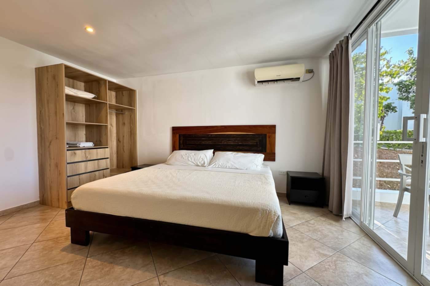 1 bedroom, desk, iron/ironing board, travel crib