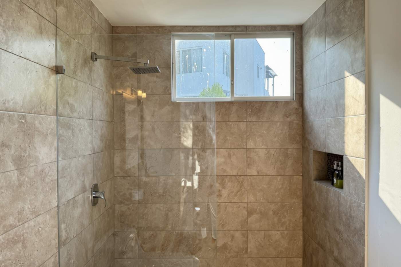 Shower, hair dryer, towels, shampoo