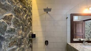 Shower, hair dryer, towels, shampoo