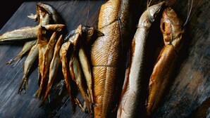 Dried fish displayed on a wooden surface. - Room for 2 People With Kitchenette (Mielno)