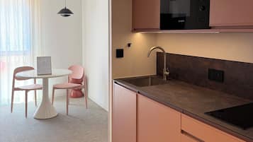 Standard Apartment, 1 Queen Bed, Mobility Accessible, Kitchen | Private kitchen | Fridge, shared microwave, stovetop, highchair