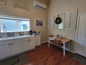 Coffee/tea maker, fridge, microwave, oven