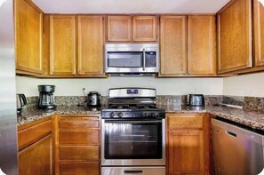 Coffee/tea maker, fridge, microwave, oven