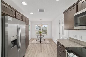 Unclassified image, 5 of 14, button - 3BR Near Brownwood Sq / Sumter Landing - Golf Cart Included - Pet Friendly (The Villages)