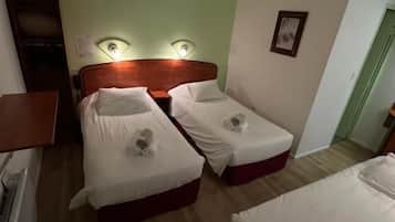 Family Triple Room | Desk, blackout drapes, iron/ironing board (on request), WiFi (free)
