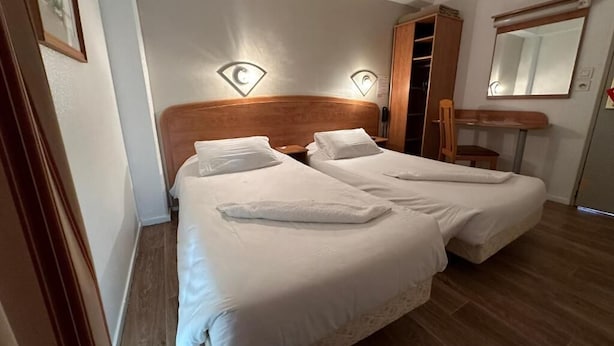 A double room with two beds, a wooden wardrobe, a mirror, and a small desk. - HAVANA (Malay-le-Grand)