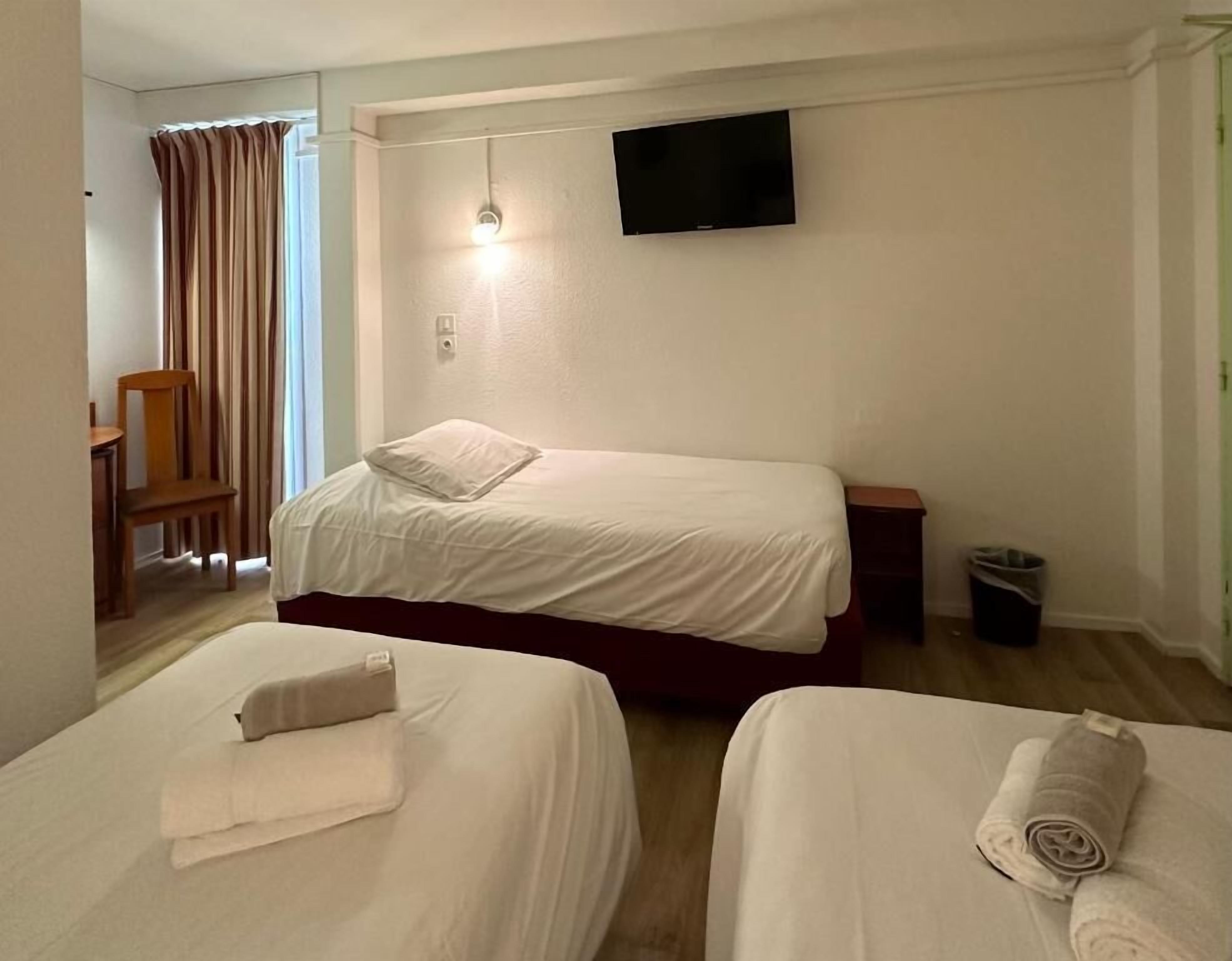 Desk, blackout curtains, iron/ironing board (on request), free WiFi