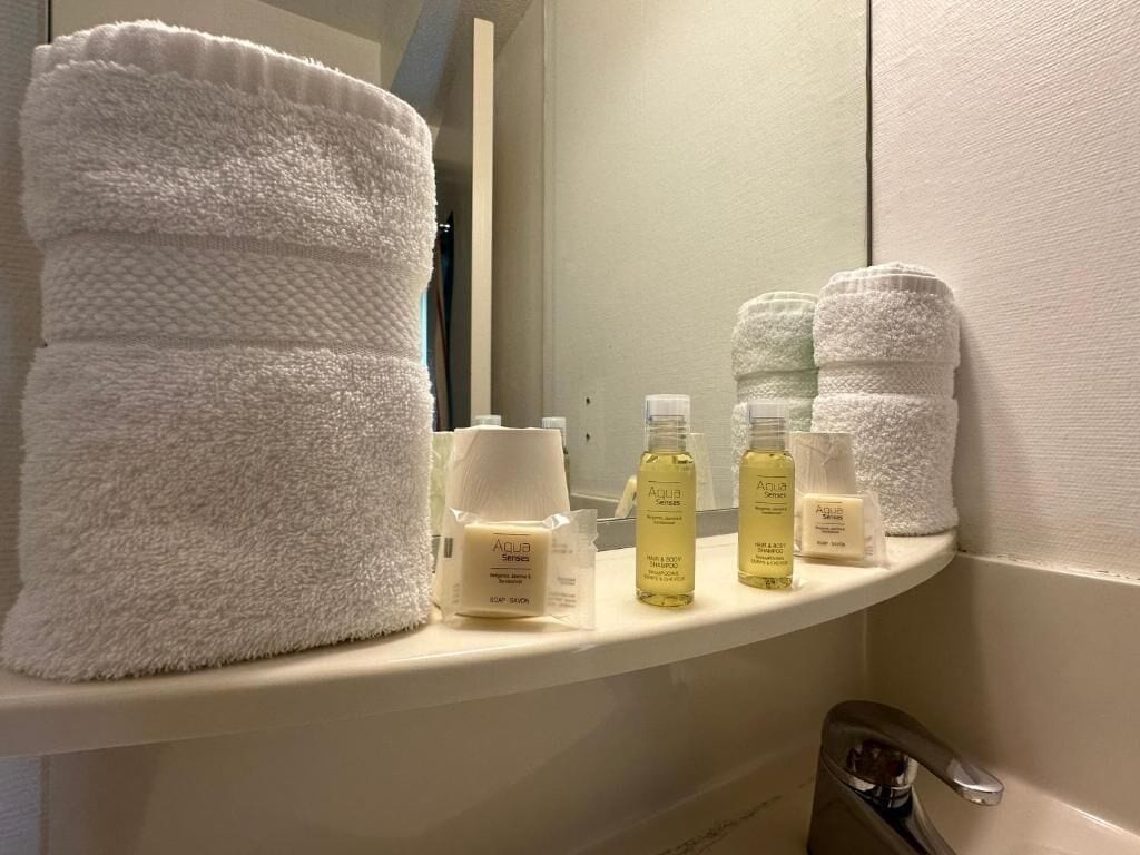 Shower, free toiletries, hair dryer, towels